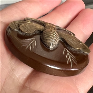 HUGE brass bee on Bakelite button.
