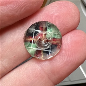 Scarce paperback faceted glass sew-thru button.