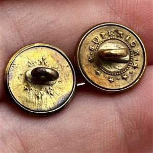 Two Jacksonian gilt brass waistcoat buttons.