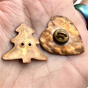 Two studio enamel buttons by Herman Lowenstein.
