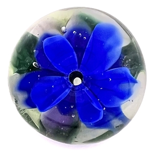 Mary Gaumonds whistle hole glass studio button of a violet.