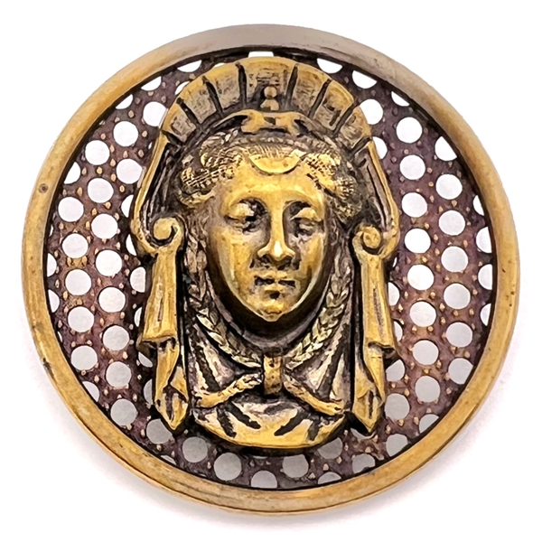 Brass screen back button of a royal womans head.