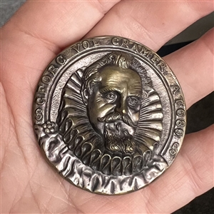“George Vol Cramer Stamped and tinted brass button copied from a coin. 