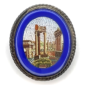 Oval Italian micro mosaic set in a cobalt glass of Greek buildings.