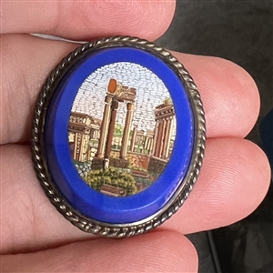 Oval Italian micro mosaic set in a cobalt glass of Greek buildings.