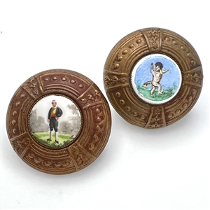 Two painted porcelain buttons set in brass.