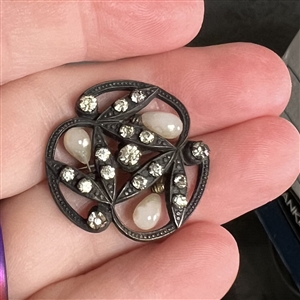 Unique metal button with pastes and pearlized “seeds.