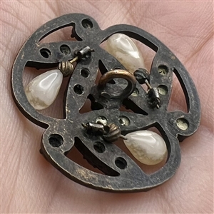 Unique metal button with pastes and pearlized “seeds.