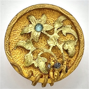 UNUSUAL heavily gilded metal button of flowers with aqua pastes.