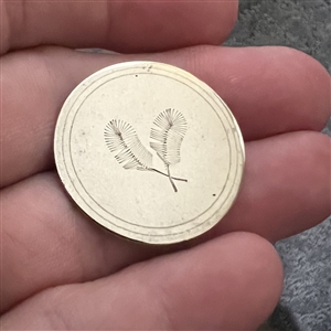An 18th c. Tombac button of two feathers. 