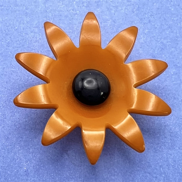 Vintage Bakelite realistic flower button.