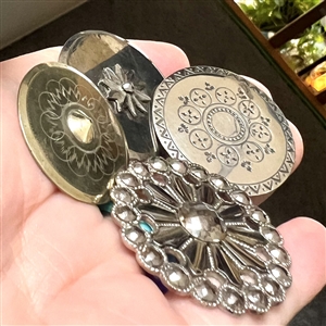 Four 18th c. and 19th c.  metal buttons.