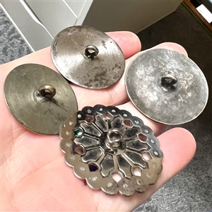 Four 18th c. and 19th c.  metal buttons.