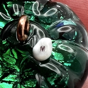 Mary Gaumond's torch-worked glass studio button of red flower.