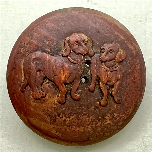 Wood button of dachshunds.