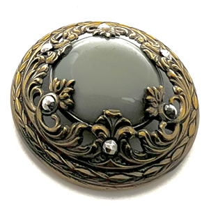 Gay 90s grey glass set in metal button.