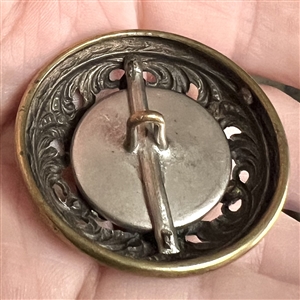 Gay 90's grey glass set in metal button.