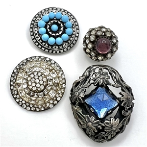 Four jeweled buttons.