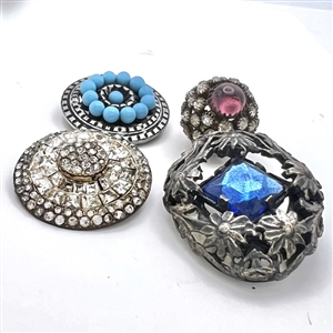 Four jeweled buttons.