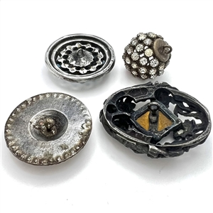 Four jeweled buttons.