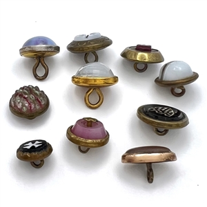 Ten glass in metal weskit buttons including a Cheshire and a Saphiret.