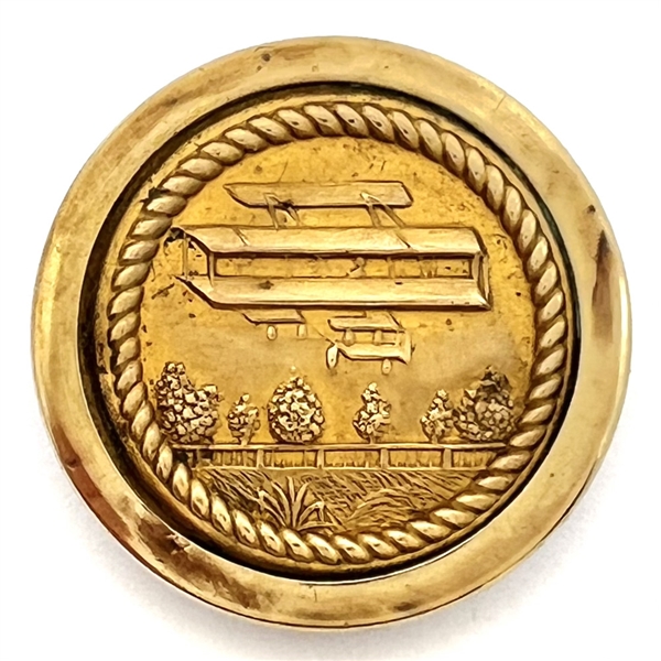 Brass button of an early airplane.