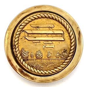 Brass button of an early airplane.