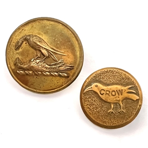 Two brass buttons - a crow work clothes and a livery crest of two birds fighting.