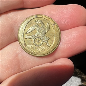 Artillery corps brass uniform button.