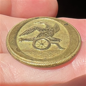 Artillery corps brass uniform button.