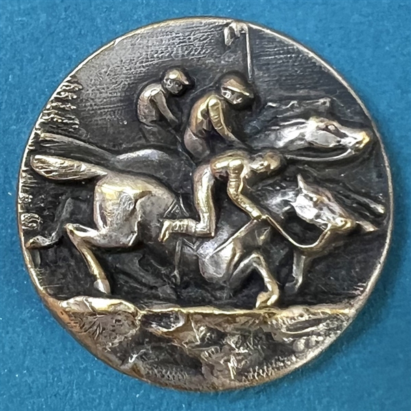 Silvered brass button of a horse race.