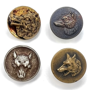Four sporting buttons of wolves and foxes.