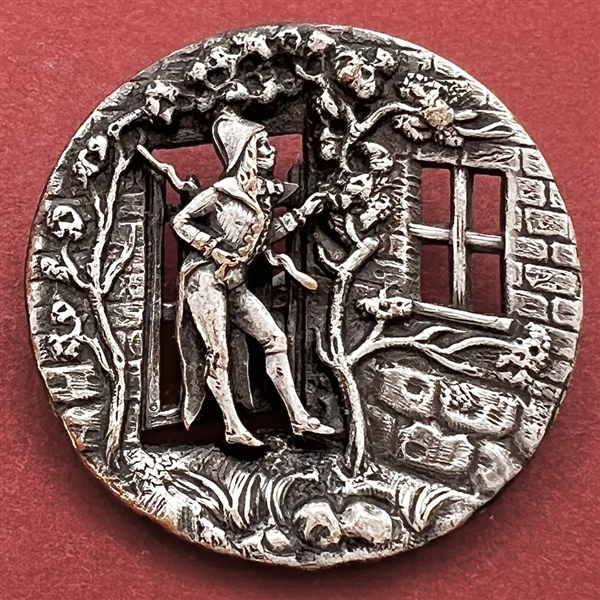 French silvered metal button of a Fop peering into an open window.