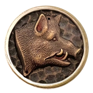 Stamped and tinted button of a boars head.