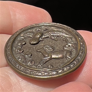 Fable button of “Eagle and the Stag.