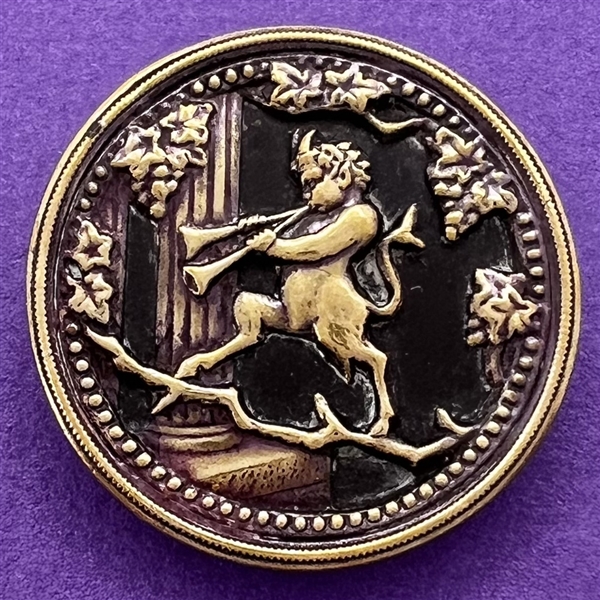 Brass button of “Satyr with Pan pipes."