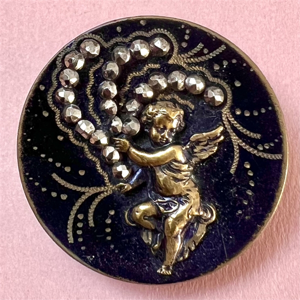 Brass button of “Winged Creature."