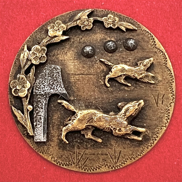 Brass button of dogs running from dog house.