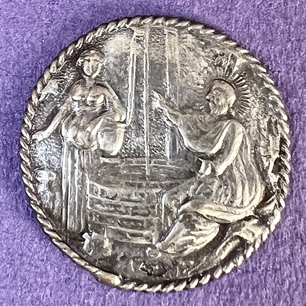 Hallmarked silver button of “Christ and the woman of Sameria."