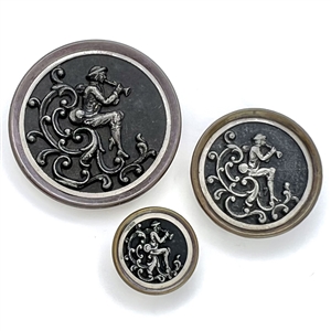 Three sizes of “Peter Pan"  buttons.