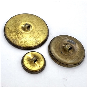 Three sizes of “Peter Pan  buttons.