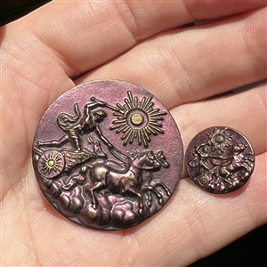 Two purple tinted brass buttons of “Phaethon in mother daughter sizes. 