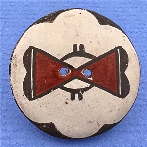 Zia pueblo ceramic pottery button with geometric pattern.