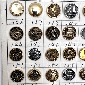 Original salesman's card of 56 aluminum buttons.