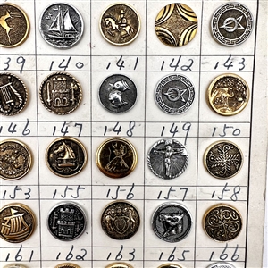 Original salesman's card of 56 aluminum buttons.