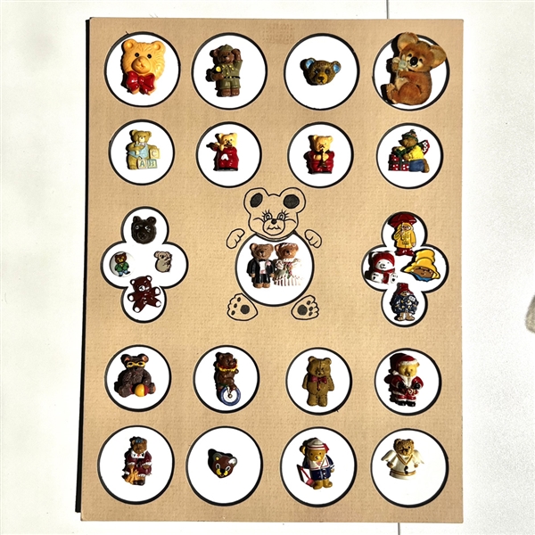 Card of 26 teddy bear and other buttons.