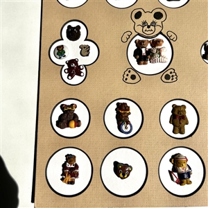 Card of 26 teddy bear and other buttons.