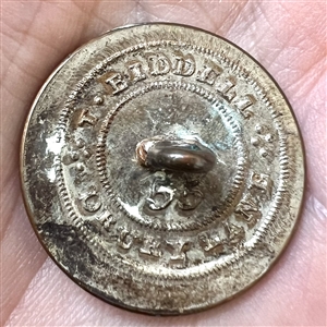 Livery crest button of a mermaid.