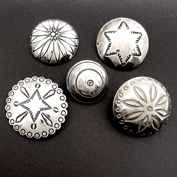 Five modern Native American silver buttons with assorted images.