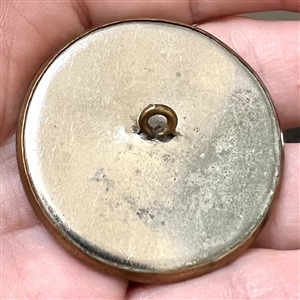 Champlevé enamel button of woman and man from the opera “Madame Sans Gene.